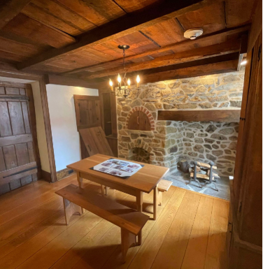 Restored Pugh Room with fireplace and beehive oven.